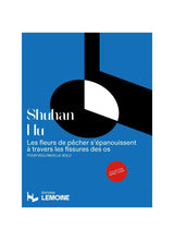 Hu: Les fleurs de pêcher s'épanouissent à travers les fissures des os